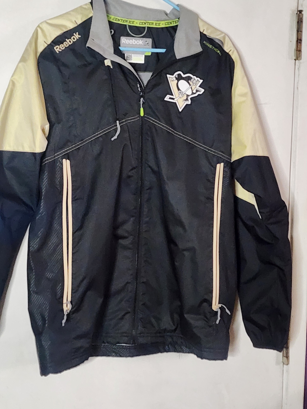 Reebok Men’s Black and Cream Windbreaker with Team Patch